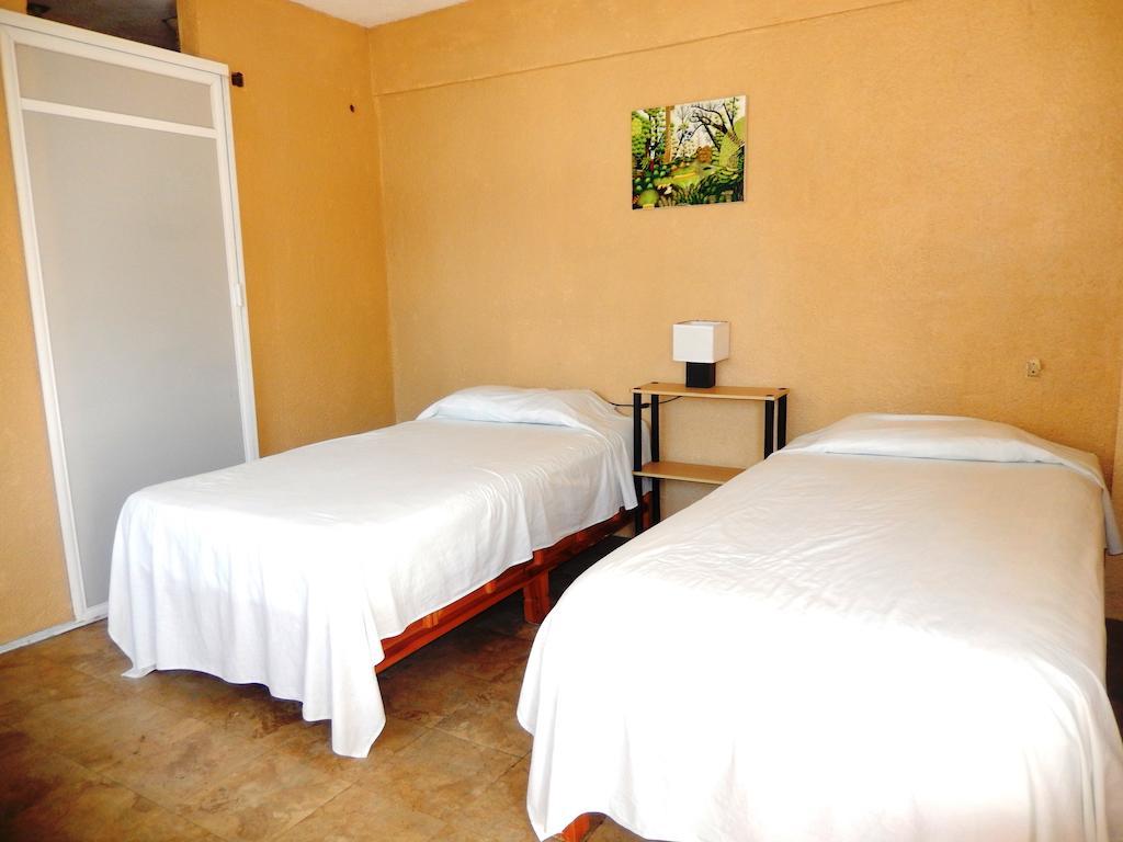 Hotel Evasion Acapulco Bilik gambar